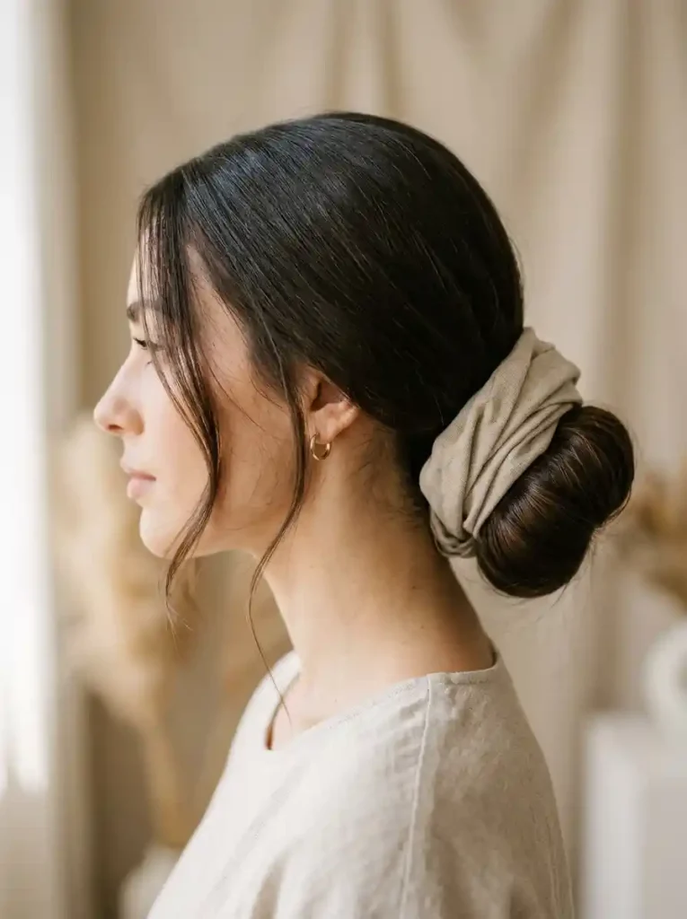 16. Scarf-Wrapped Low Bun