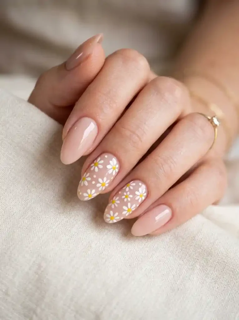 5. Delicate Daisy Nude Nails